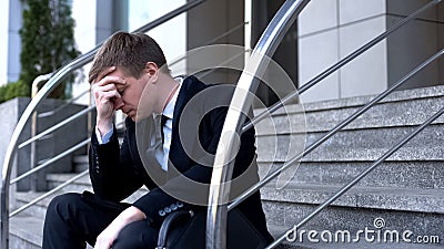 Desperate director thinking of company problem, bankruptcy depression, crisis Stock Photo