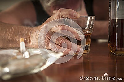 Desperate, lonely alcoholic man Stock Photo