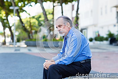 Desperate and lonely retired businessman Stock Photo