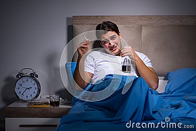 The desperate man divorced in bed Stock Photo