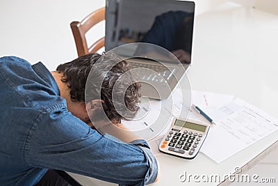 Desperate man trying to find solution for taxes and bills Stock Photo