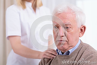 Desperate sad pensioner Stock Photo