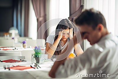 Desperate woman crying.Emotional problems.Relationship issues.Breaking up,divorce,having hurtful conversation.Confession Stock Photo