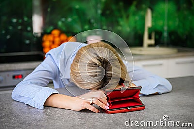 Desperate woman has no more money left Stock Photo