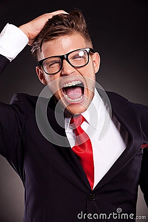 Desperate young business man Stock Photo