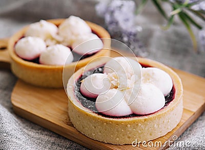 Dessert basket with blueberries jam on wooden tray Stock Photo