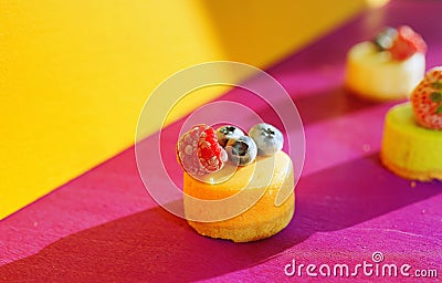 Dessert with berries. Colourful food. Sweet meal. Cheese cakes. Restaurant menu. Stock Photo