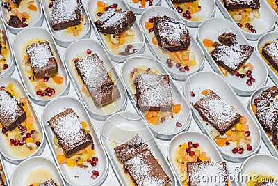 Dessert buffet with warm cinnamon cake and fresh fruit, Germany Stock Photo