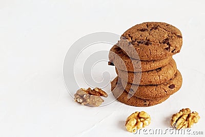 Dessert. Delicious fragrant shortbread homemade cookies according to the original recipe with dark chocolate and raisins and walnu Stock Photo