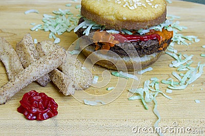 Dessert impostor cheeseburger and apple fries Stock Photo