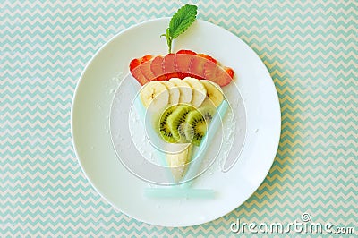 Dessert made of fruits. Summer food. Colourful breakfast. Restaurant menu. Healthy lunch. Stock Photo