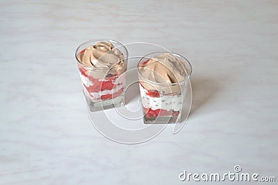 Dessert in portioned glasses Stock Photo