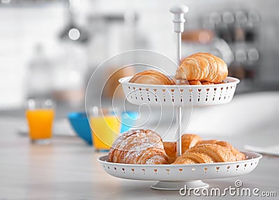Dessert stand with tasty croissants Stock Photo