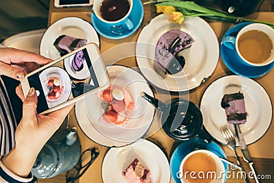 Dessert sweets party time. Mobile photo food blogger. Top view restaurant cafe breakfast Stock Photo