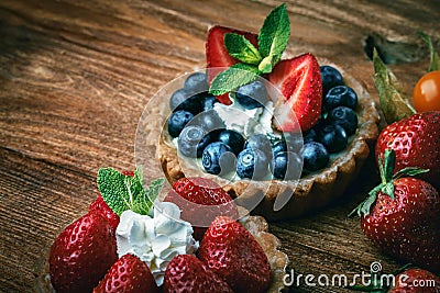 Desserts on wooden table Stock Photo