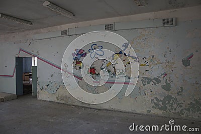 destroyed brick buildings on the territory of an old children's camp in the summer forest. Ulyanovsk Editorial Stock Photo