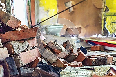 Destroyed homes, pile of bricks in the blurry background of ruined walls. Cartoon Illustration