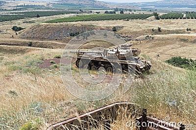 Destroyed Israeli tank is after the Doomsday Yom Kippur War on the Golan Heights in Israel, near the border with Syria Editorial Stock Photo
