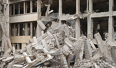 Destruction of city buildings damaged concrete structure during war Stock Photo