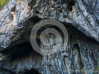 Detail above the entrance to Stopica cave which is located on the slopes of the mountain Zlatibor in Serbia Stock Photo