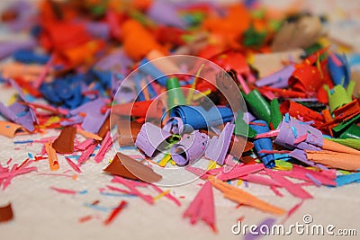 Detail of an abstract image of a pile or heap of colored shavings or remains of colored pencils Stock Photo