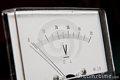 Detail of an analog voltmeter, pointer scale Stock Photo