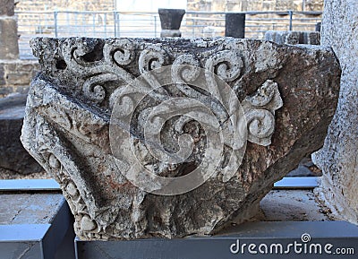 Detail of an Ancient Capital in Capernaum Stock Photo