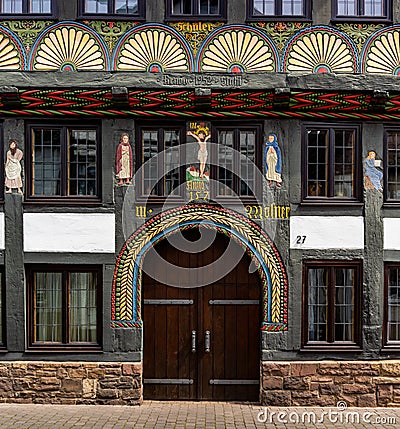 Detail architectural view of the historic Adam and Eva house in Hoexter Editorial Stock Photo