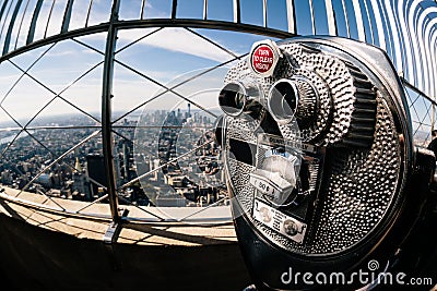 Detail of binoculars and background view of New York City from the Empire State Building. USA America, Manhattan Stock Photo