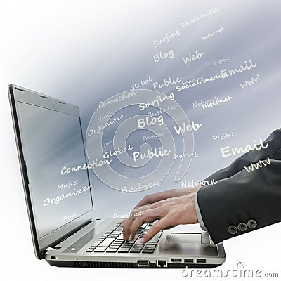 Detail of blurred hands using laptop Stock Photo