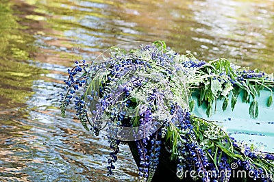 Detail of boat, decoration flowers, lupine. Outdoor Stock Photo