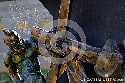 Detail of bronze reliigious sculptural group of Eilght Station Of The Cross - Jesus meets the women of Jerusalem. Editorial Stock Photo