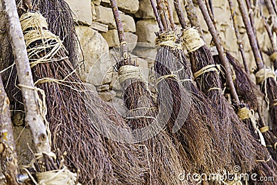 Detail of brooms for witches at halloween Stock Photo