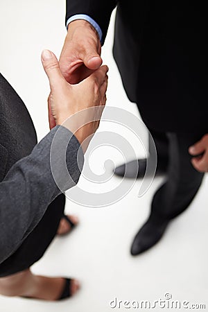 Detail businessman and woman shaking hands Stock Photo