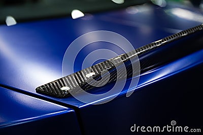 Detail of car rear spoiler carbon fiber texture finished Stock Photo
