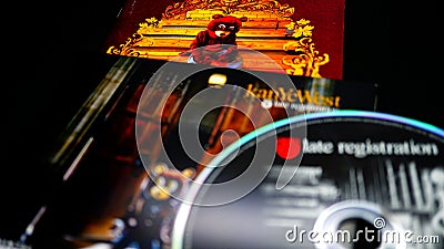 Detail of CDs and artwork of musician, beatmaker, rapper, record producer, songwriter, KANYE WEST. has 5 songs that have exceeded Editorial Stock Photo