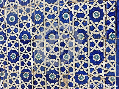 Detail of a ceramic blue wall with geometric forms and flowers to Khiva in Uzbekistan. Editorial Stock Photo