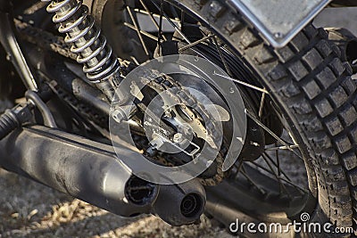 Detail of the chained transmission of a vintage motorcycle. Stock Photo