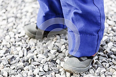 Detail of child legs in overalls - boy in workwear Stock Photo