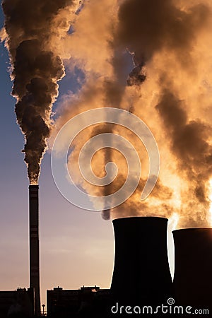 Detail of chimney and cooling towers , coal fired power station Stock Photo