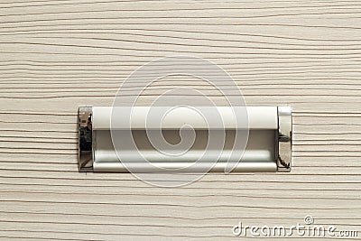 Detail of chrome silver handle for doors or drawers. Fragment of Stock Photo