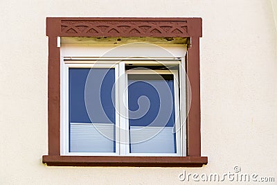 detail of classicistic window at house facade Stock Photo
