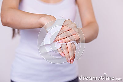 Detail of cleaning hands with wet wipes Stock Photo