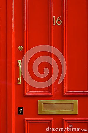 Detail Close-up of a Bright Red Door in London England Stock Photo