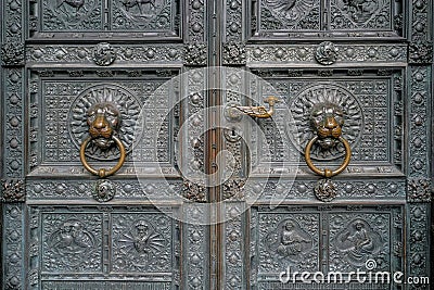 Lion Head Door Ancient Knocker in Cologne Cathedral,Germany Stock Photo