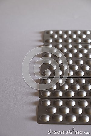 Detail of a closed silver blister with pills Stock Photo