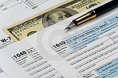Detail closeup of current tax forms for IRS filing Editorial Stock Photo