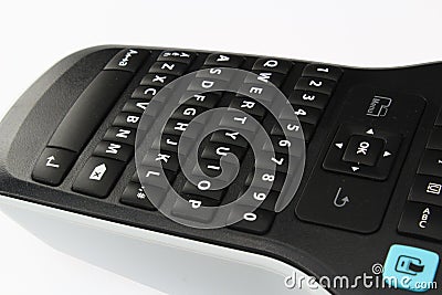 Detail of compact QWERTY keyboard on handheld label printer device, white background Stock Photo
