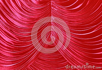 Detail of a contracted red curtain Stock Photo