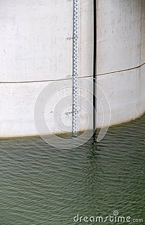 detail of a dam, the water level indicator Stock Photo